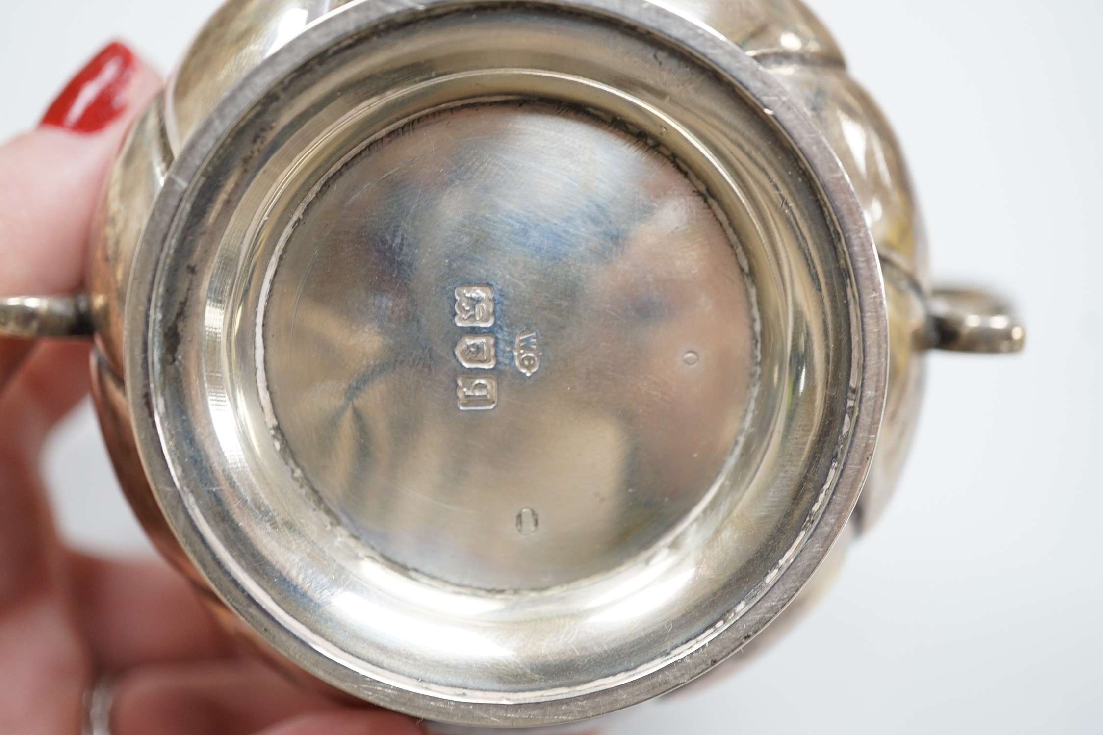 A George V silver presentation porringer and cover for the 'Rudge Motorcycle Sprint Race at Brooklands 13th of June 1912, third prize' William Comyns, height 10.5cm, 6.1oz.